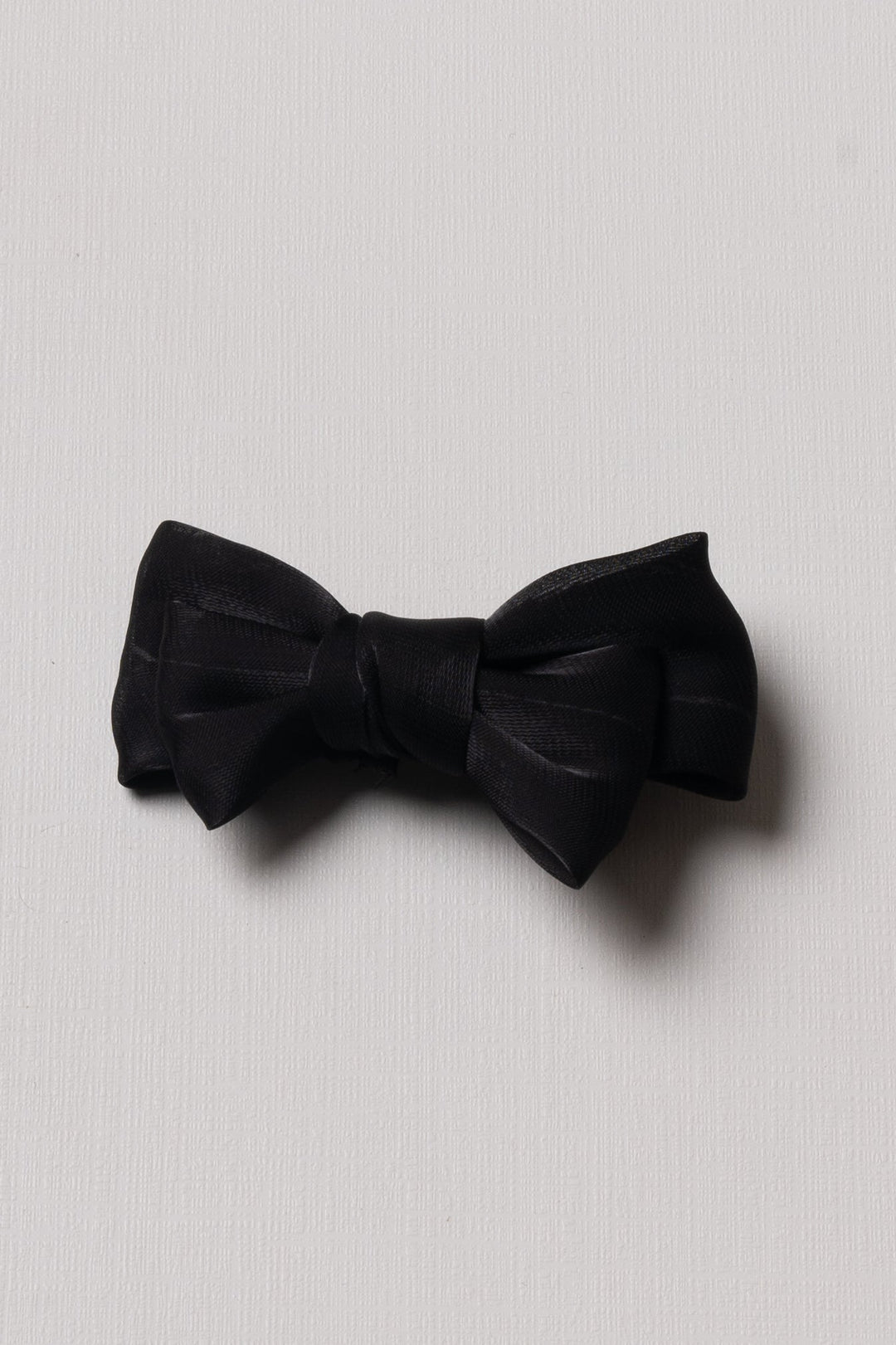 The Nesavu Hair Clip Midnight Elegance: Classic Black Bow Clip Nesavu Black JHCL77C Chic Black Satin Bow Hair Clip | Timeless Accessory for Sophisticated Styles | The Nesavu