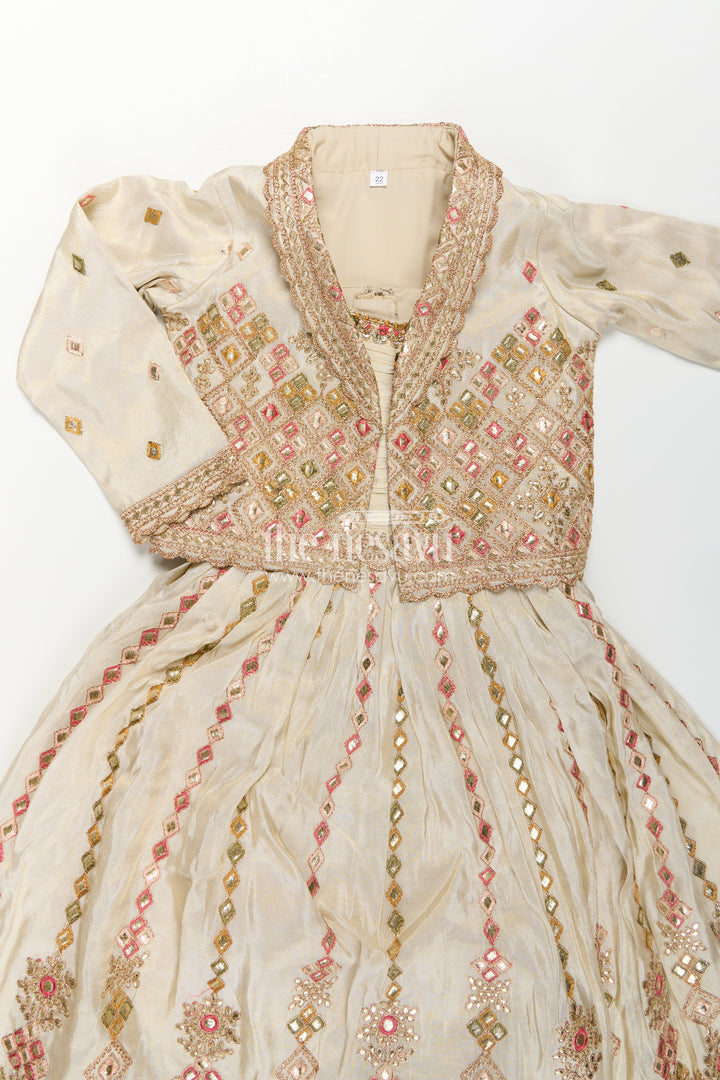 Girls Designer Anarkali in Ivory Shimmer Silk with Embroidered Jacket and Pleated Skirt Finish