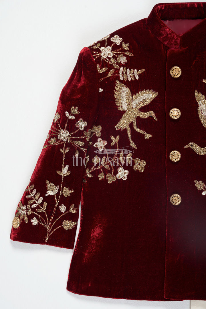 Boys Maroon Sherwani Kurta with Intricate Golden Velvet Embroidery and Cream Trousers