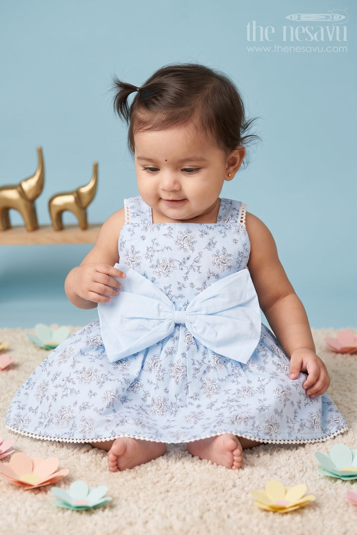 Baby Girls Blue Cotton Floral Frock with Large Bow and Lace Detailing for Casual Outings