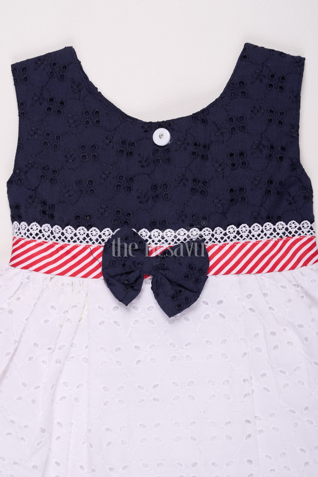 Girls Black Cotton Frock with Eyelet Embroidery and Striped Bow Detail for Special Occasions