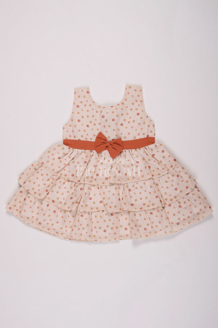 Girls Cream Brasso Polka Dot Dress with Rust Bow and Layered Skirt for Festive Gatherings