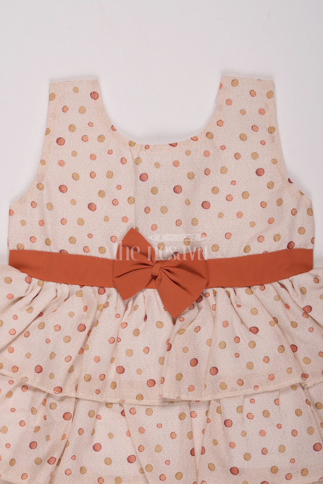 Girls Cream Brasso Polka Dot Dress with Rust Bow and Layered Skirt for Festive Gatherings