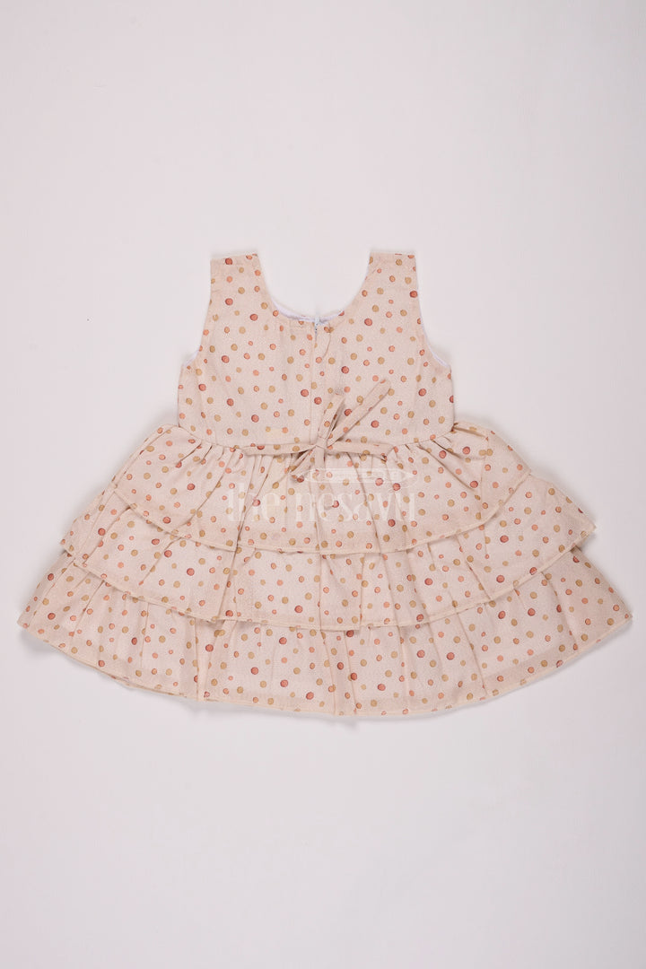 Girls Cream Brasso Polka Dot Dress with Rust Bow and Layered Skirt for Festive Gatherings