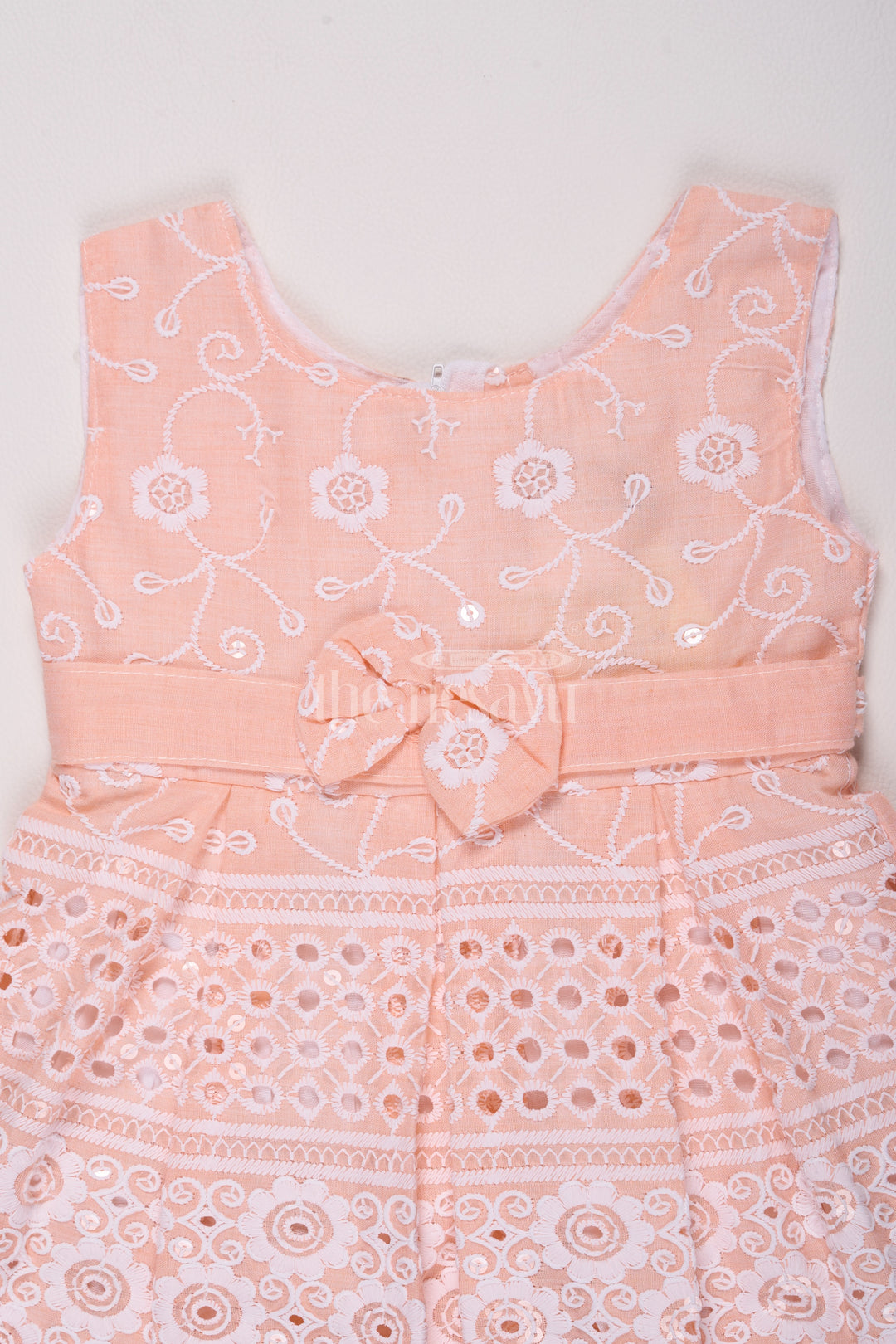 Girls Peach Cotton Embroidered Frock with Floral Design and Bow Detail for Celebrations