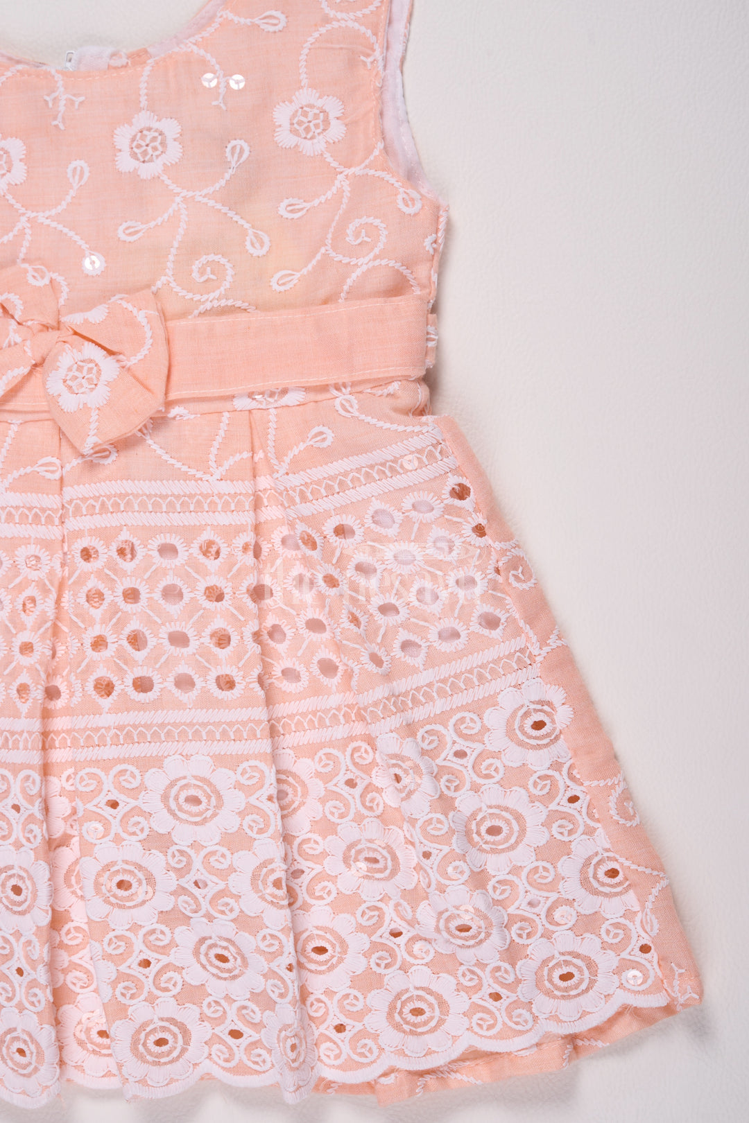 Girls Peach Cotton Embroidered Frock with Floral Design and Bow Detail for Celebrations