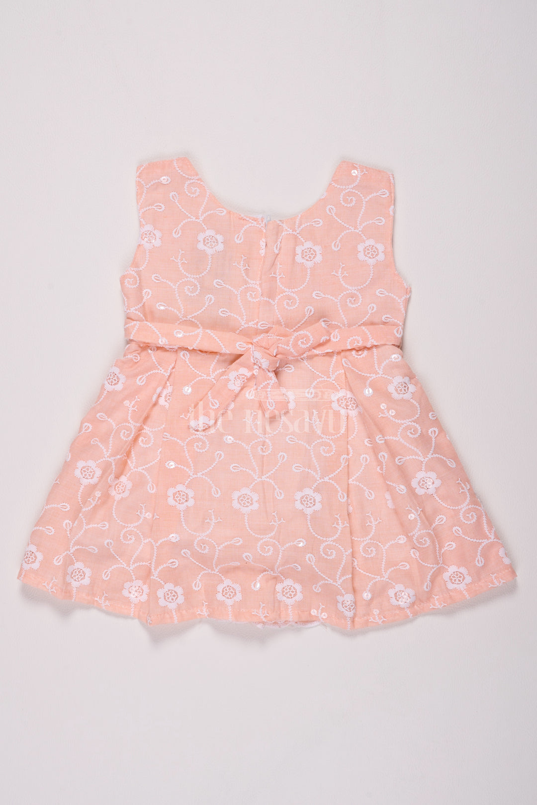 Girls Peach Cotton Embroidered Frock with Floral Design and Bow Detail for Celebrations