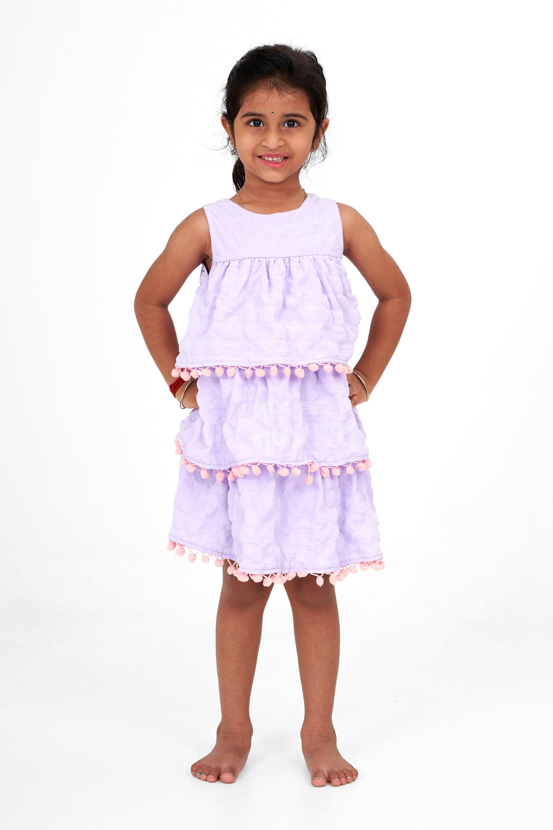 Lilac-Tiered Girls Fancy Frock with Pom-Pom Trim and Sleeveless Design for Parties