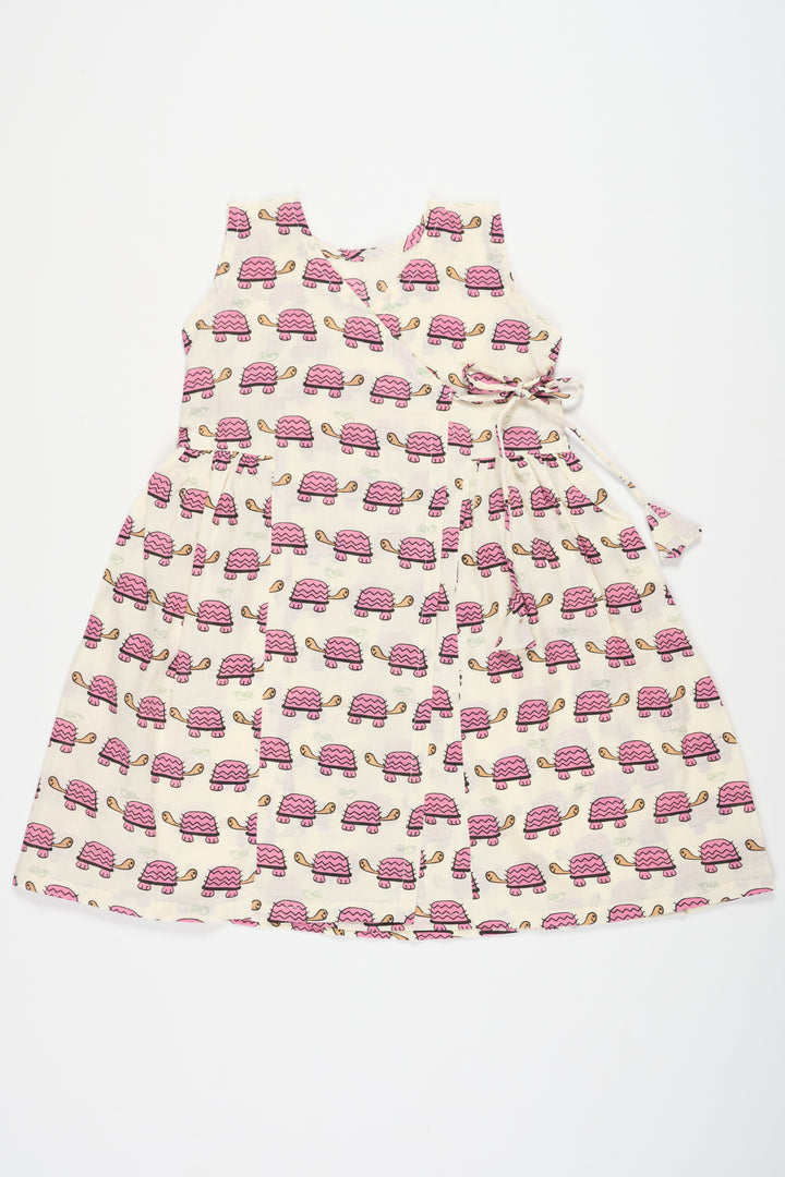 Mini Cotton Frock for Babies with Pink Tortoise Print Ideal for Playful Days