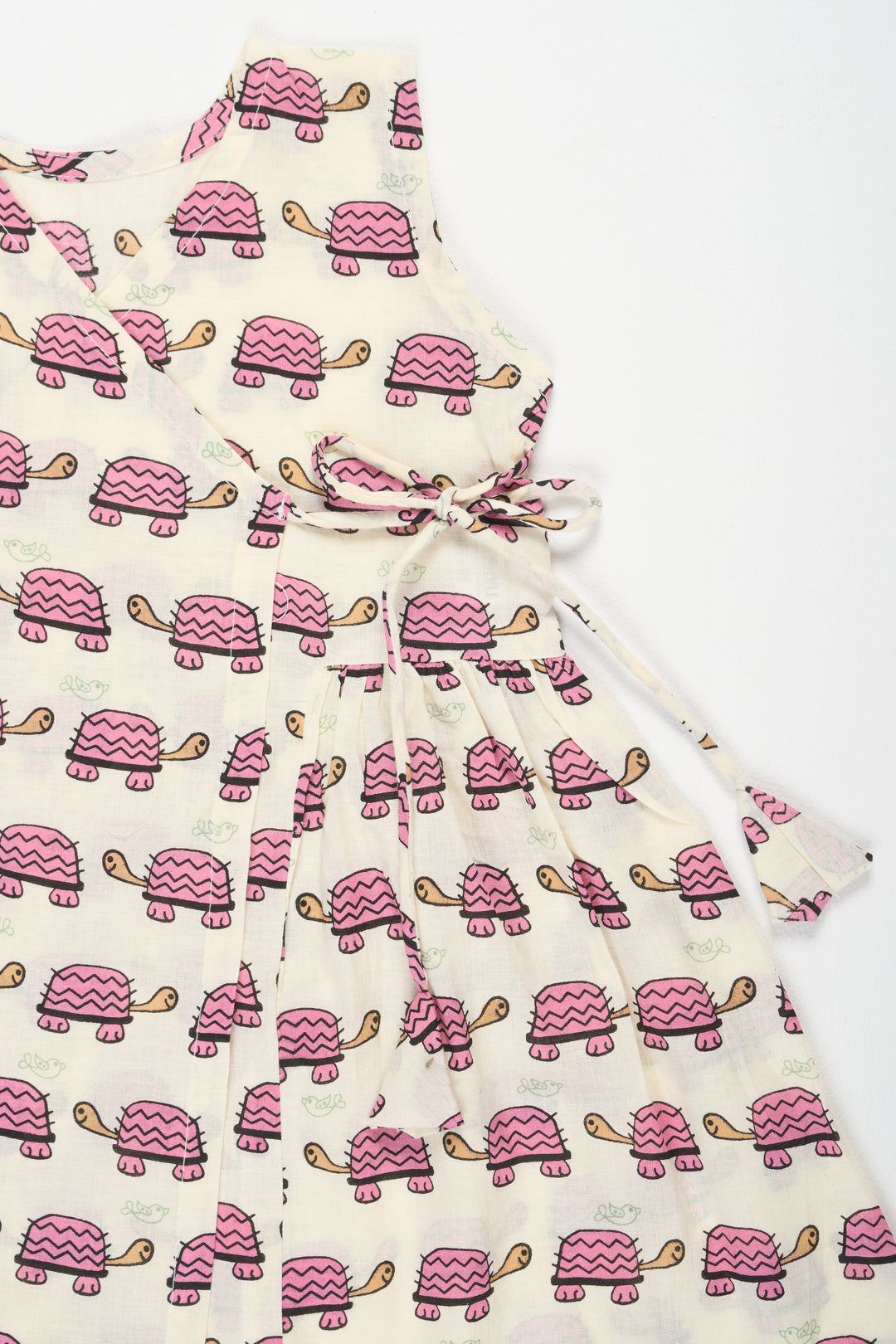 Mini Cotton Frock for Babies with Pink Tortoise Print Ideal for Playful Days