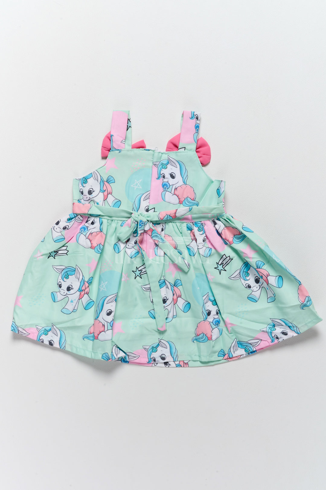 Baby Fancy Poly Crepe Simple Frock with Unicorn Prints and Pink Bow Accents