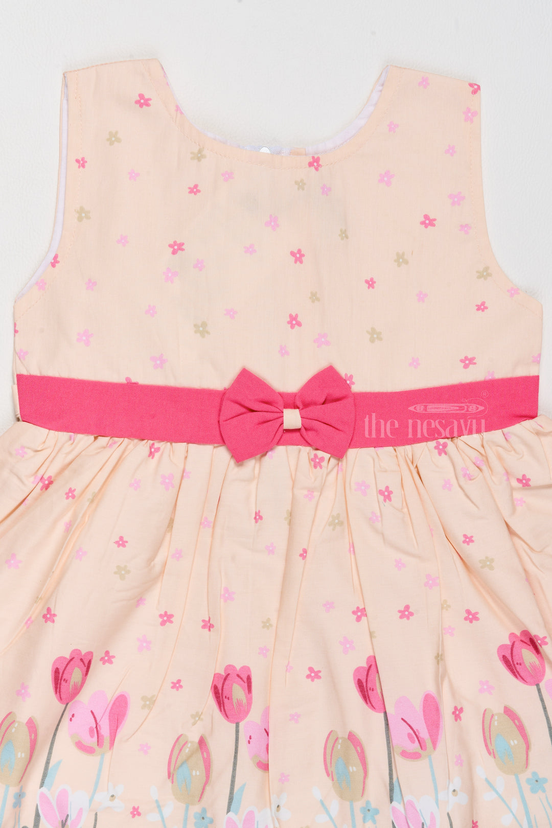 Daily Wear Cotton Dress for Girls with Tulip Prints and Decorative Bow