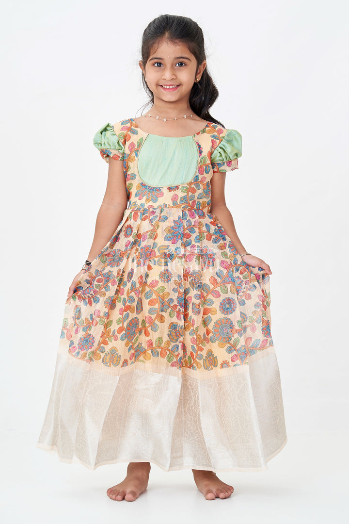 Yellow Gown Dress for Girls with Embroidered Floral Motifs and Raw Silk Yoke in Chanderi Cotton Blend