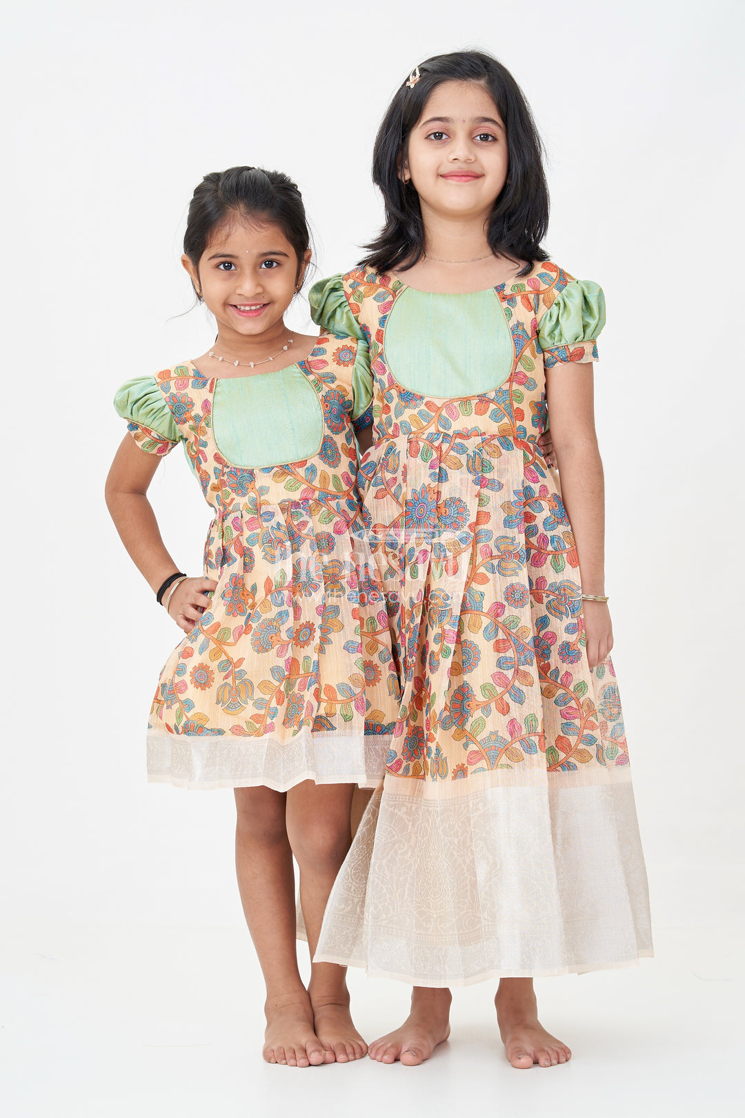 Yellow Gown Dress for Girls with Embroidered Floral Motifs and Raw Silk Yoke in Chanderi Cotton Blend