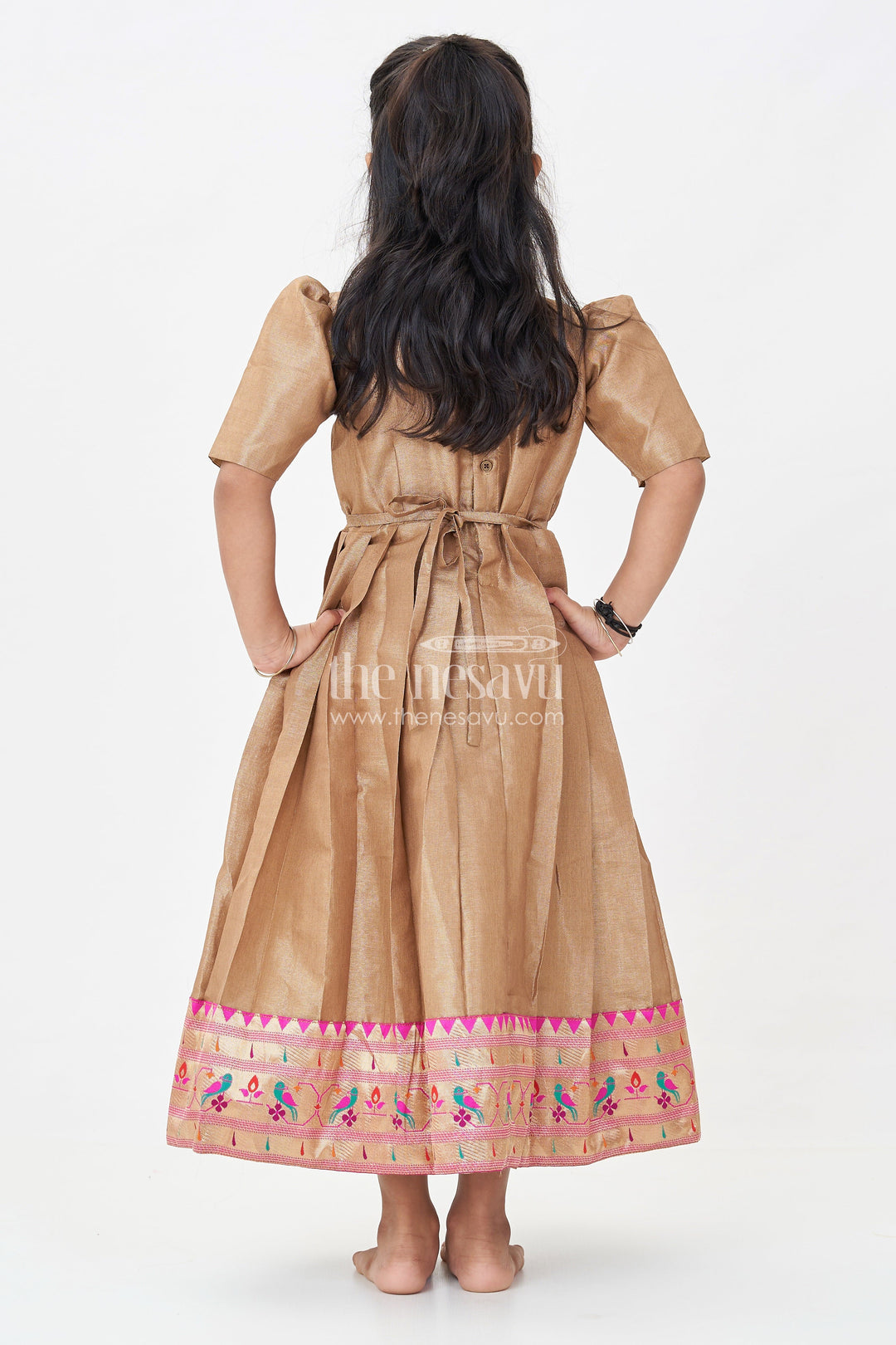 Girls Anarkali Style Gown in Brown Tissue with Paithani Border and Structured Pleats