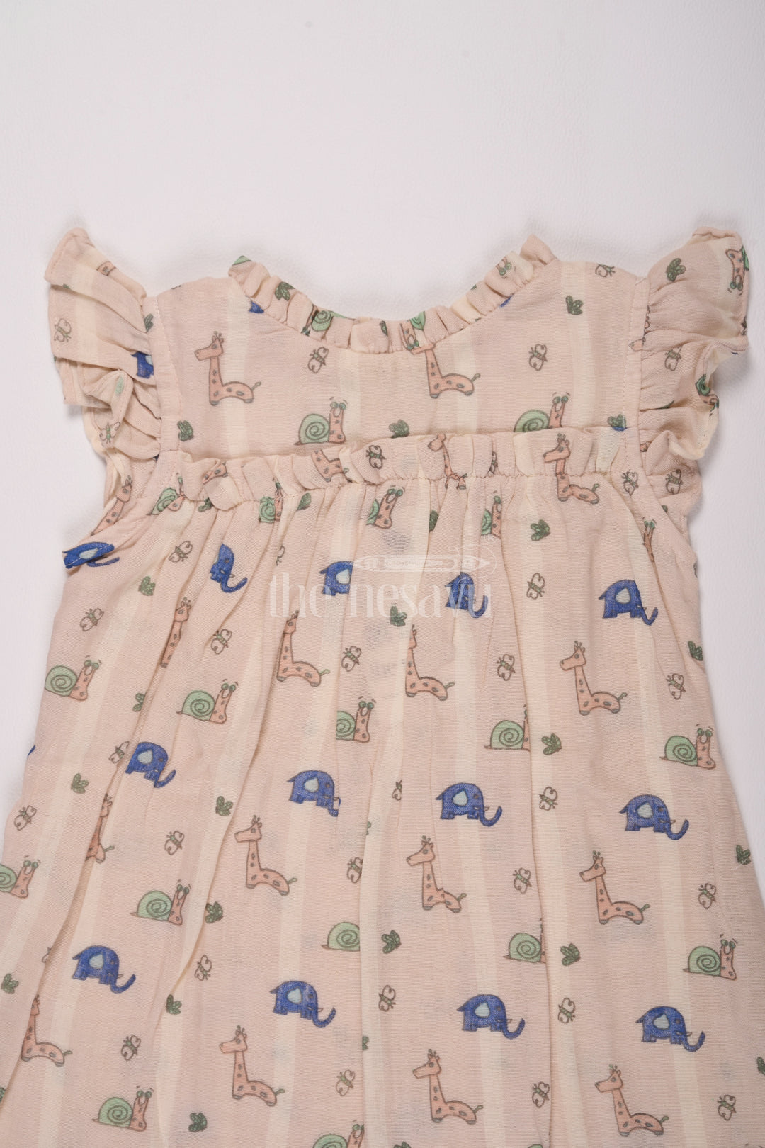 Girls Cotton Frock Ka Design Featuring Snail and Giraffe Print in Muslin Fabric