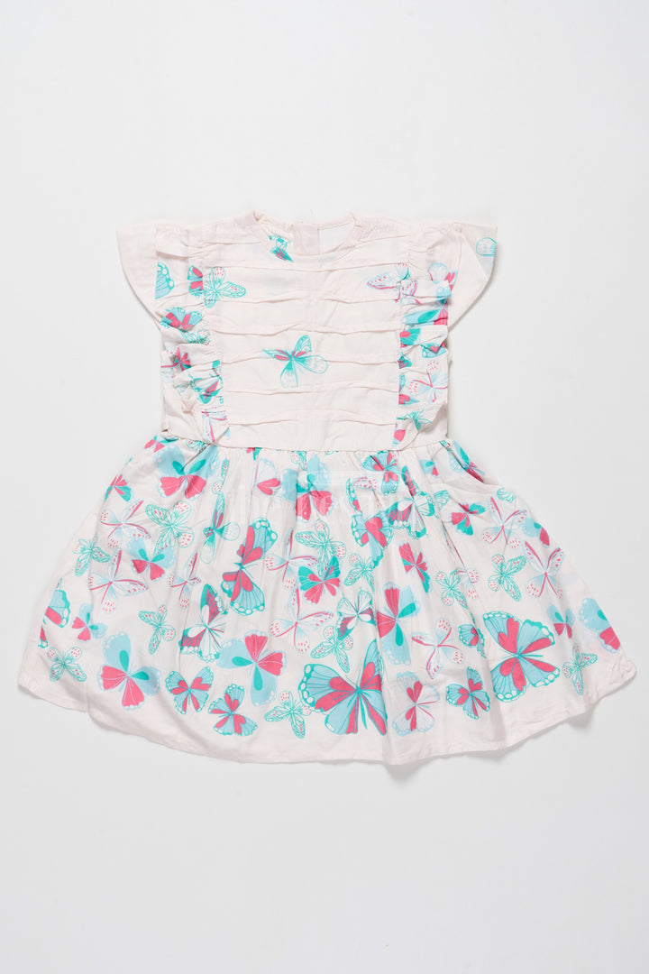 Lovely Cotton Frock for Girls with Butterfly Print and Ruffle Sleeves – Ideal for Stylish Outings