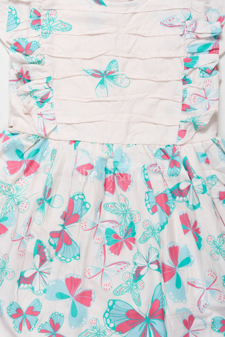 Lovely Cotton Frock for Girls with Butterfly Print and Ruffle Sleeves – Ideal for Stylish Outings