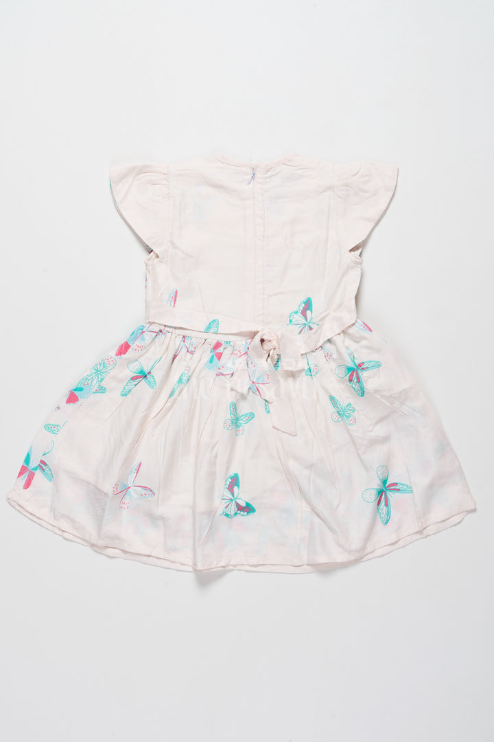 Lovely Cotton Frock for Girls with Butterfly Print and Ruffle Sleeves – Ideal for Stylish Outings