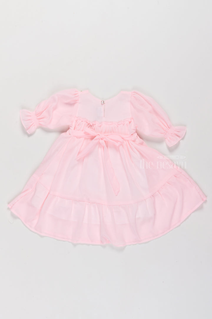 Girls Formal Dresses in Soft Pink with Smocked Detailing and Puff Sleeves