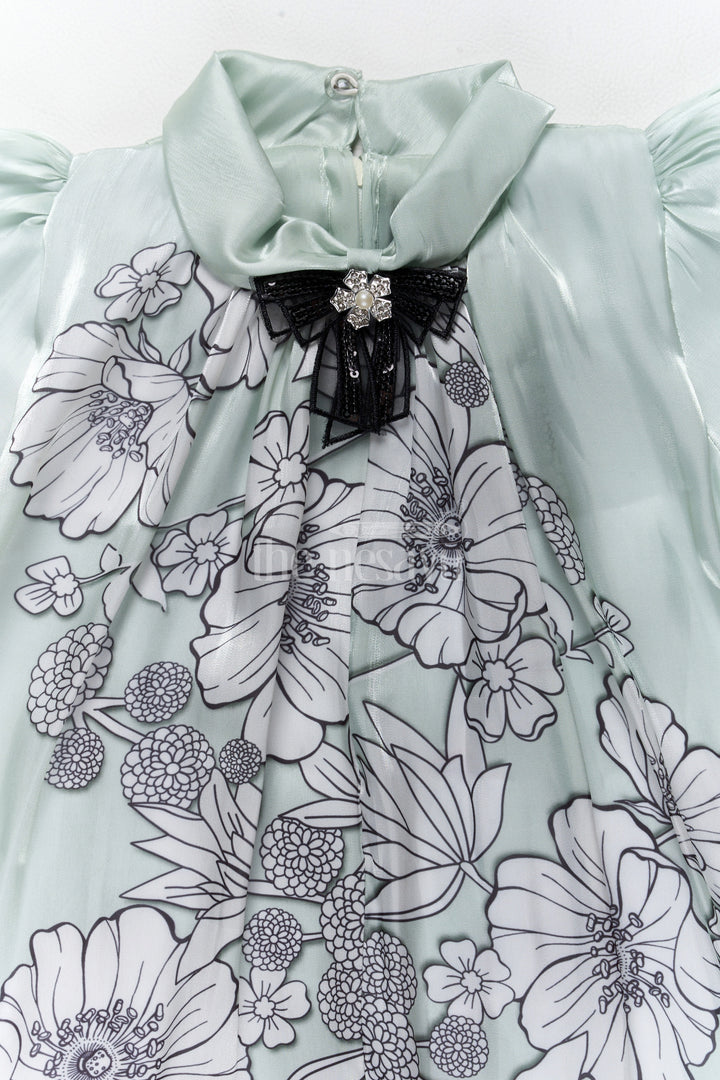 Graceful Girls Fancy Frock in Green Georgette with Floral Prints and Pleated Hem