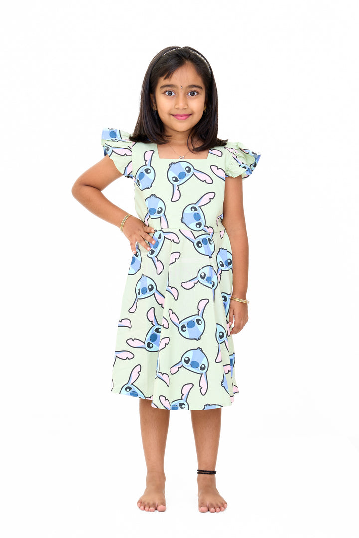 Adorable Girls Pure Cotton Frock with Playful Cartoon Print and Cap Sleeves