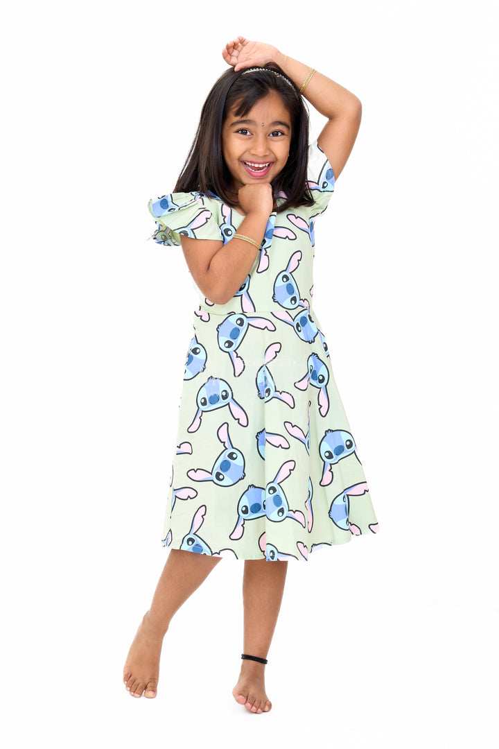 Adorable Girls Pure Cotton Frock with Playful Cartoon Print and Cap Sleeves