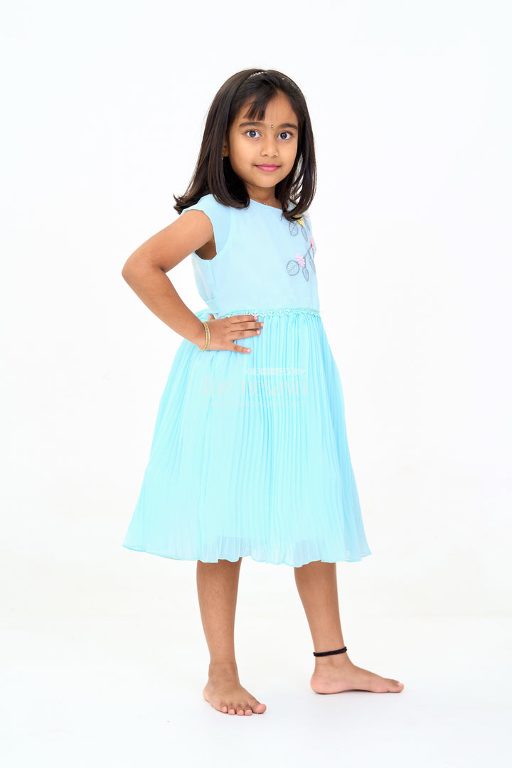 Girls Poly Georgette Frock in Aqua Blue with Floral Appliqué and Pleated Skirt