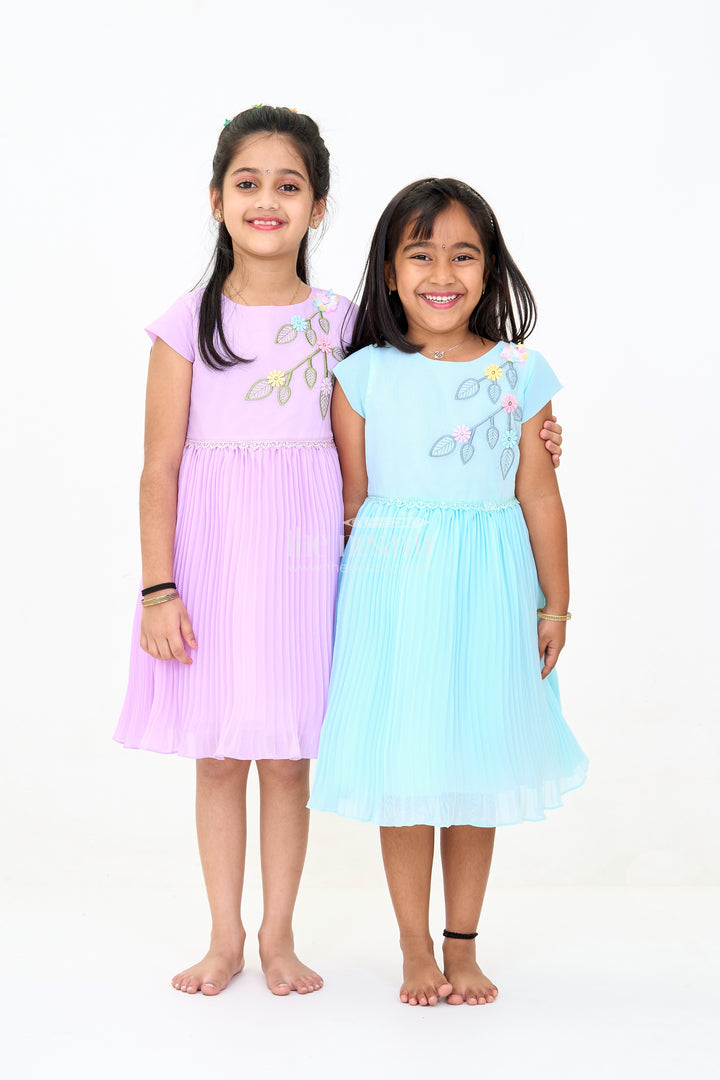 Girls Poly Georgette Frock in Aqua Blue with Floral Appliqué and Pleated Skirt