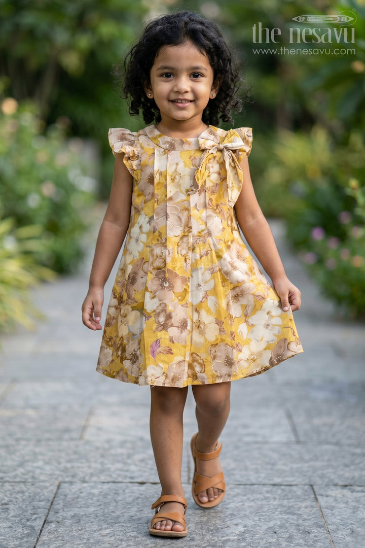 Girls Yellow Cotton Frock with Floral Prints and Elegant Pleats for Comfortable Everyday Wear