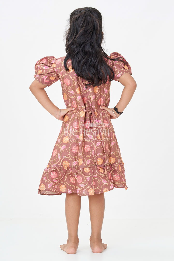 Girls Sleeves Design Frock in Brown Muslin Silk with Floral Print and Gathered Hem for Everyday Charm