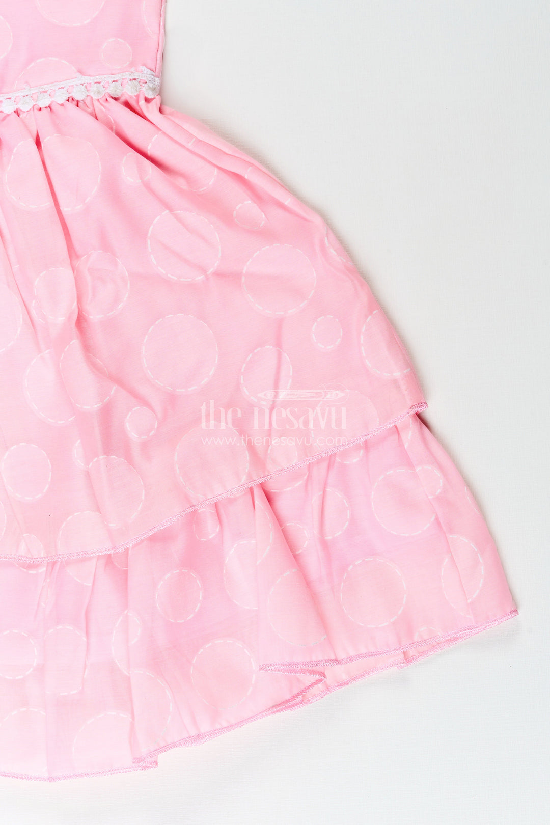 Girls pink georgette frock with polka dots for birthday celebrations