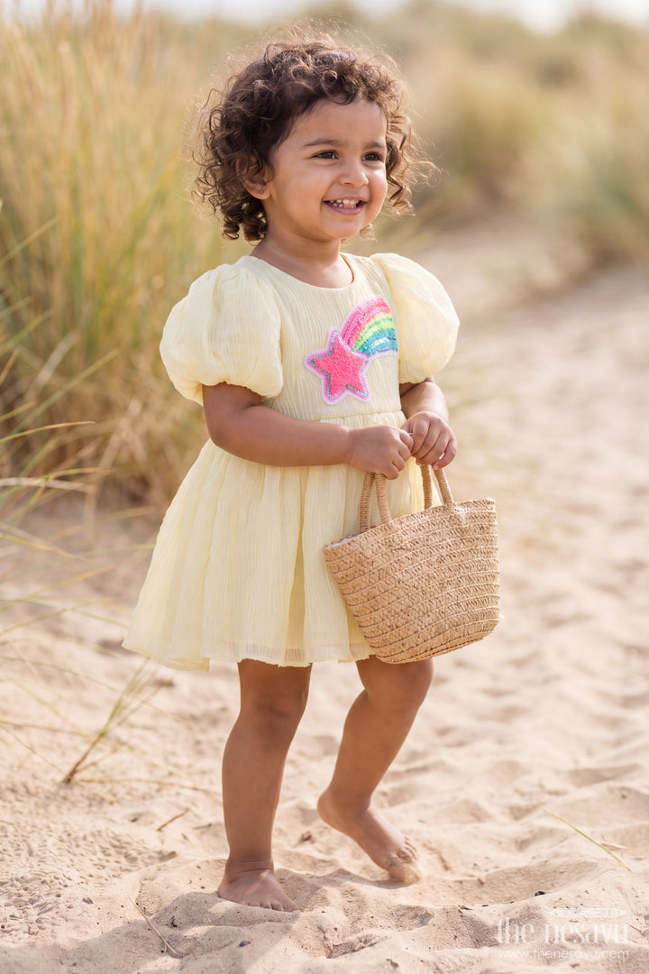 Girls Fancy Frock in Yellow with Smart Tailoring