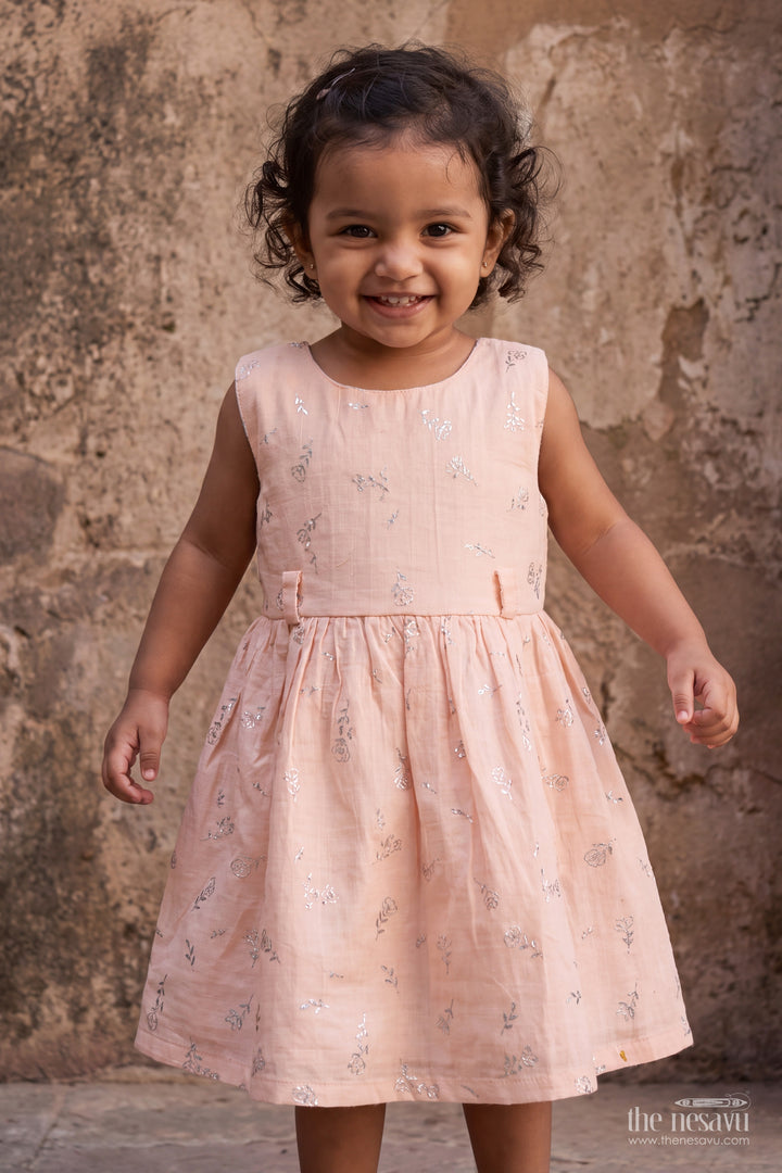 Girls Muslin Cotton Frock in Pale Peach with Silver Foil Motif