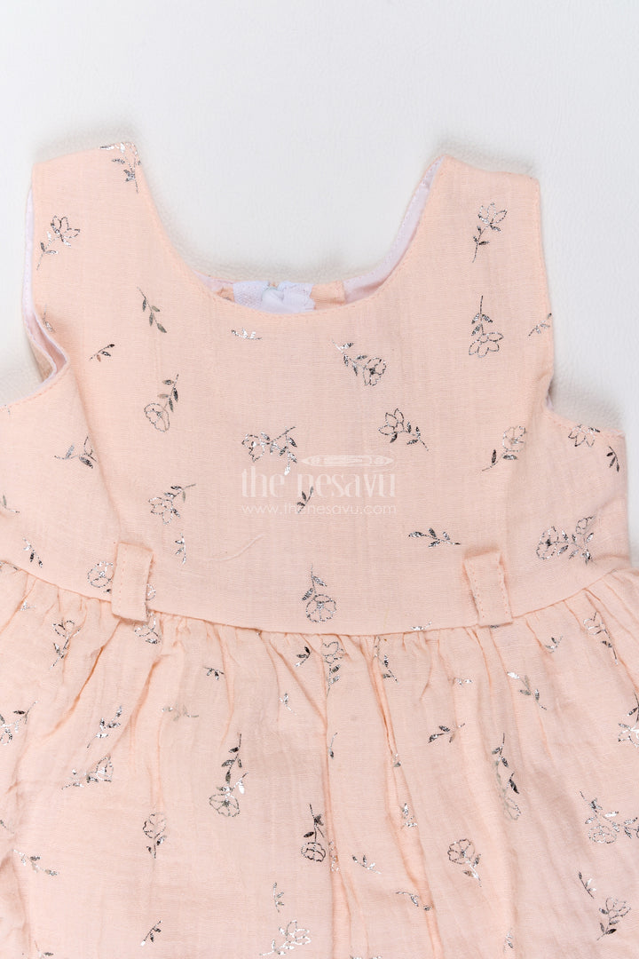 Girls Muslin Cotton Frock in Pale Peach with Silver Foil Motif