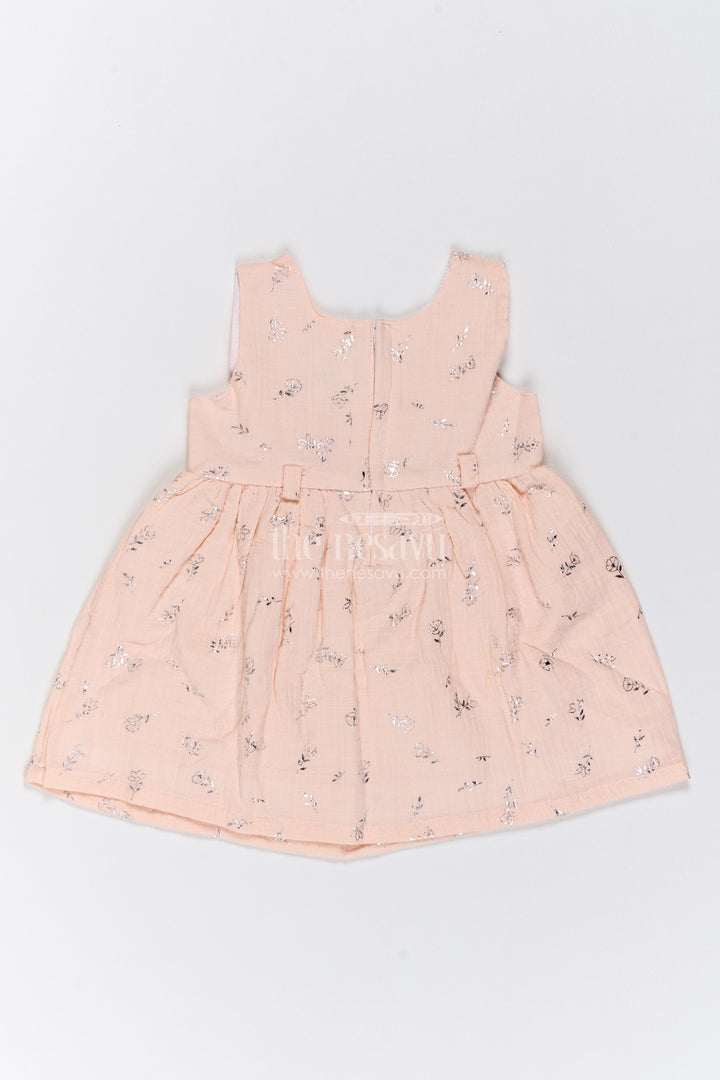 Girls Muslin Cotton Frock in Pale Peach with Silver Foil Motif