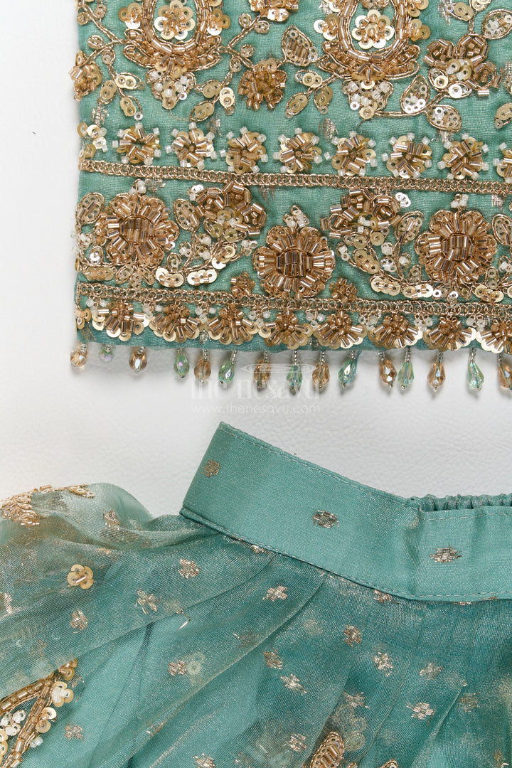 Fancy Lehenga for Girls in Turquoise with an Occasion Ready Finish