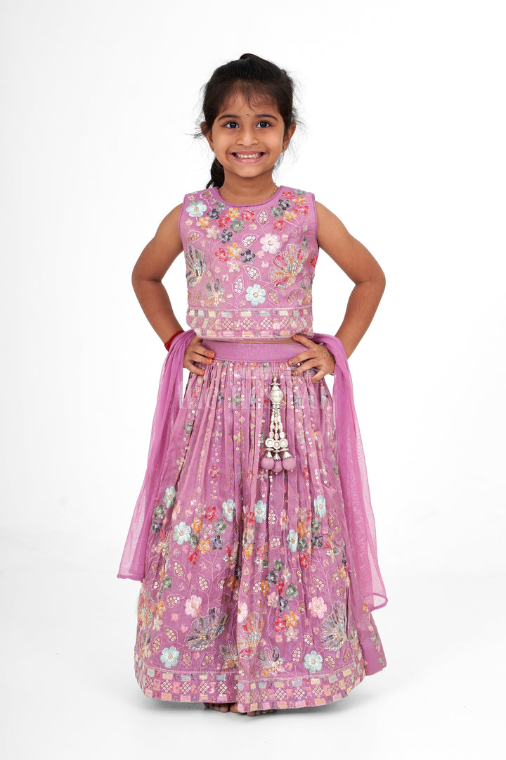 Girls Pink Lehenga Choli with Intricate Floral Embroidery and Tassel Embellishments