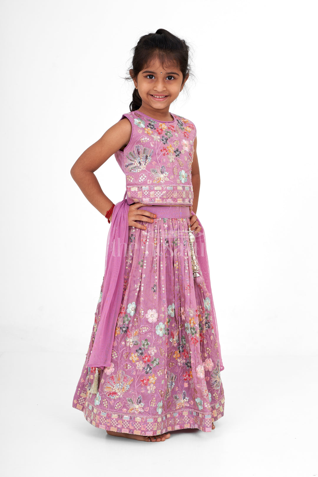 Girls Pink Lehenga Choli with Intricate Floral Embroidery and Tassel Embellishments