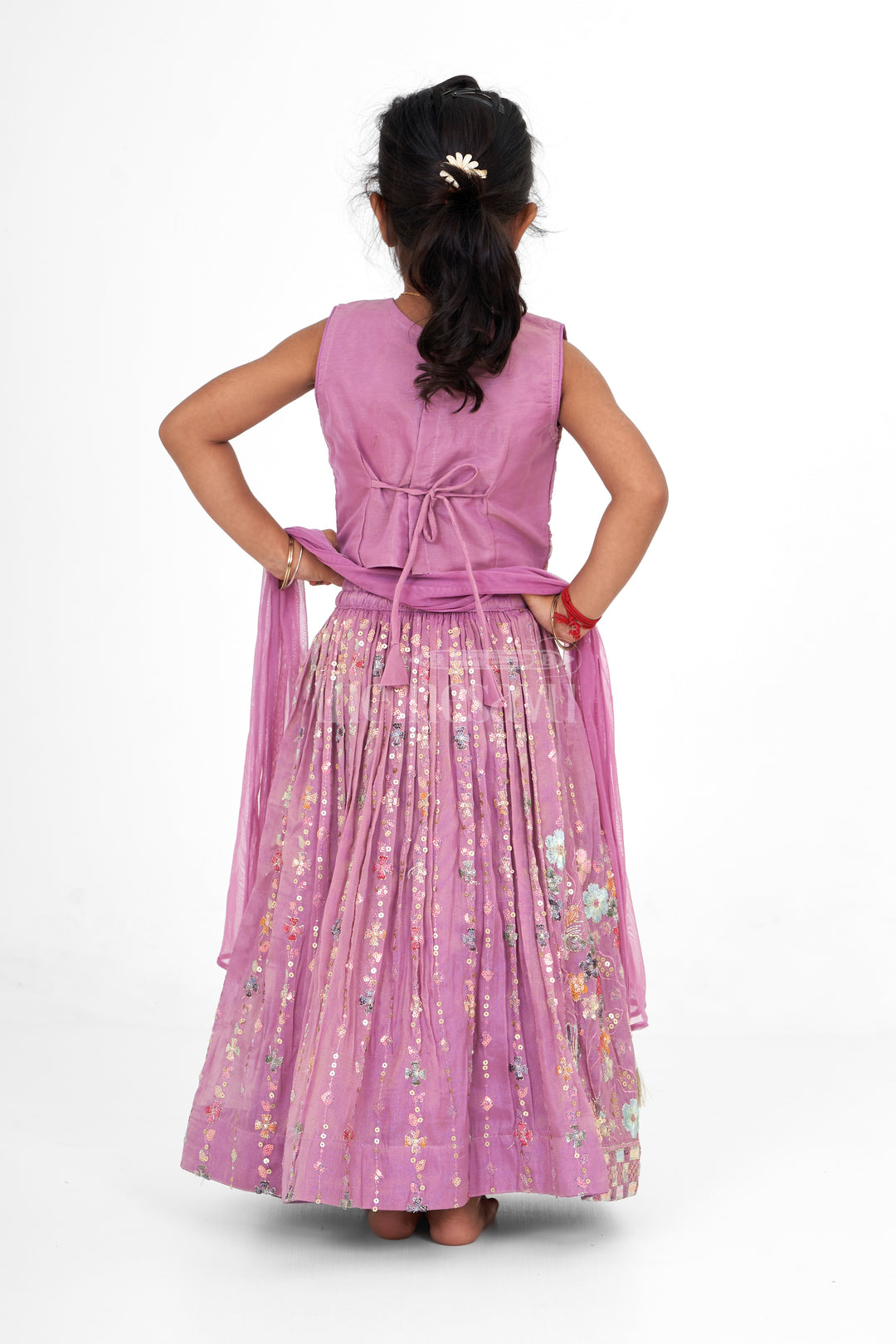 Girls Pink Lehenga Choli with Intricate Floral Embroidery and Tassel Embellishments