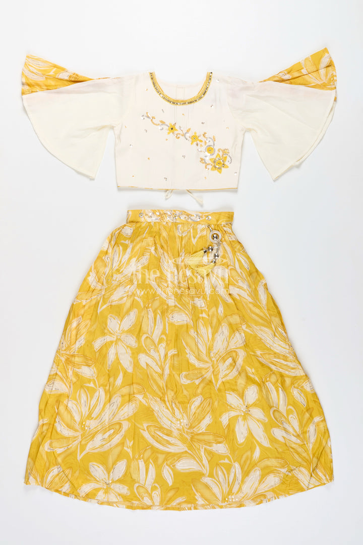 Girls lehenga choli set with floral print and flutter sleeves