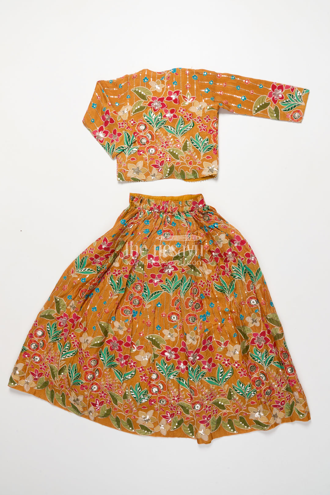 Girls lehenga set with embroidered blouse and digital print skirt