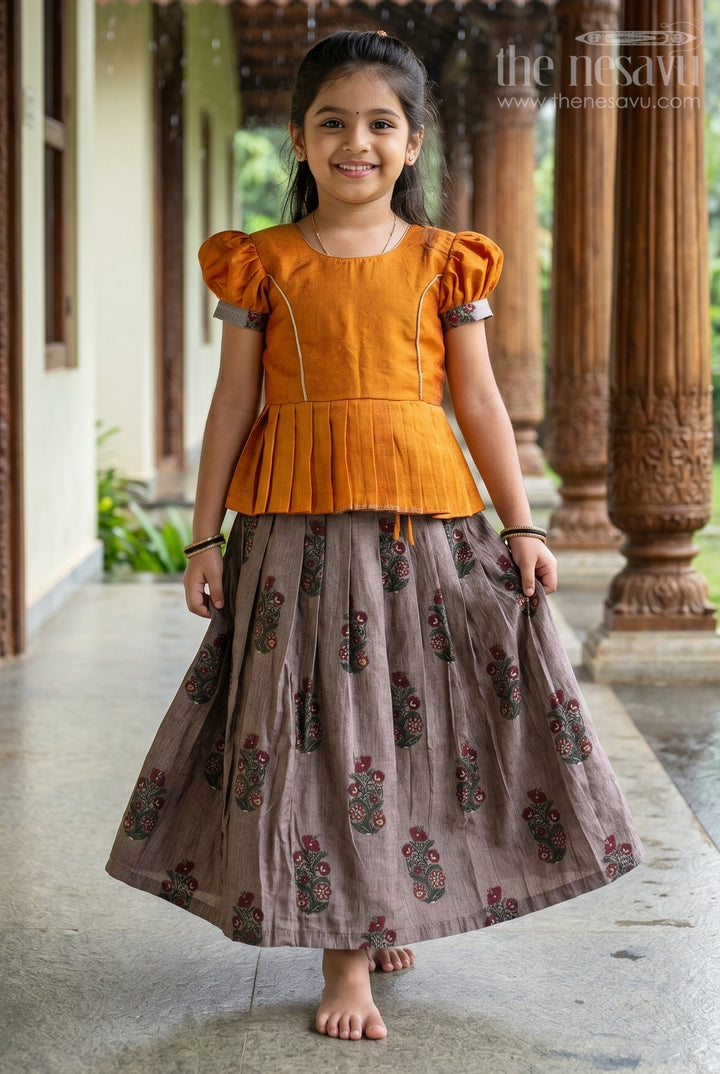 Girls Traditional Pattu Pavadai Dress in Orange and Black with Silk Blend Fabric and Elegant Zari Accents