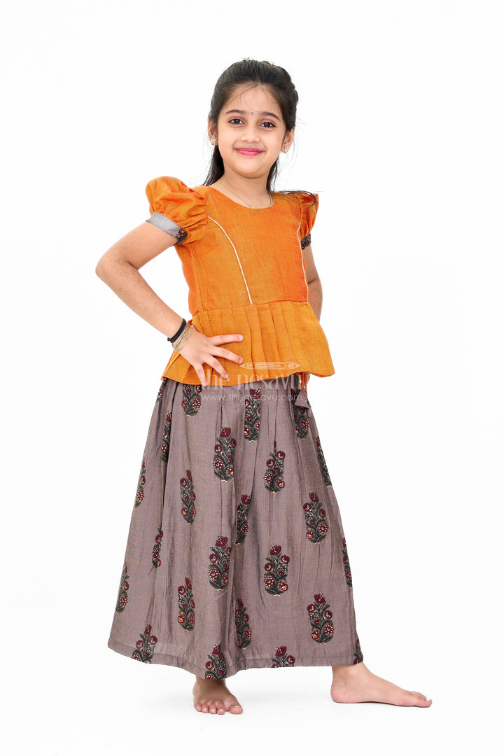 Girls Traditional Pattu Pavadai Dress in Orange and Black with Silk Blend Fabric and Elegant Zari Accents