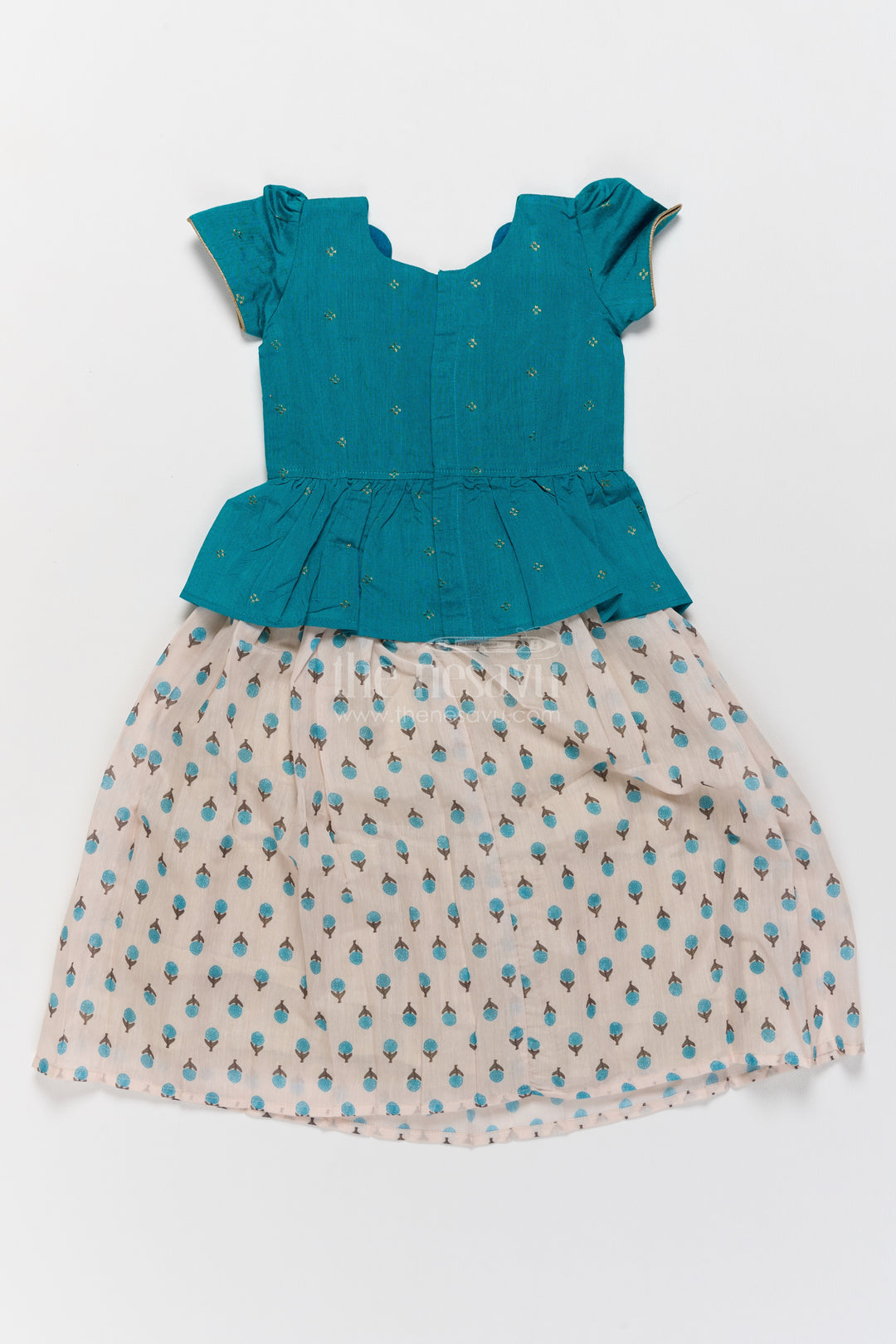 Pattu Pavadai for Girls in Green with an Occasion Ready Finish