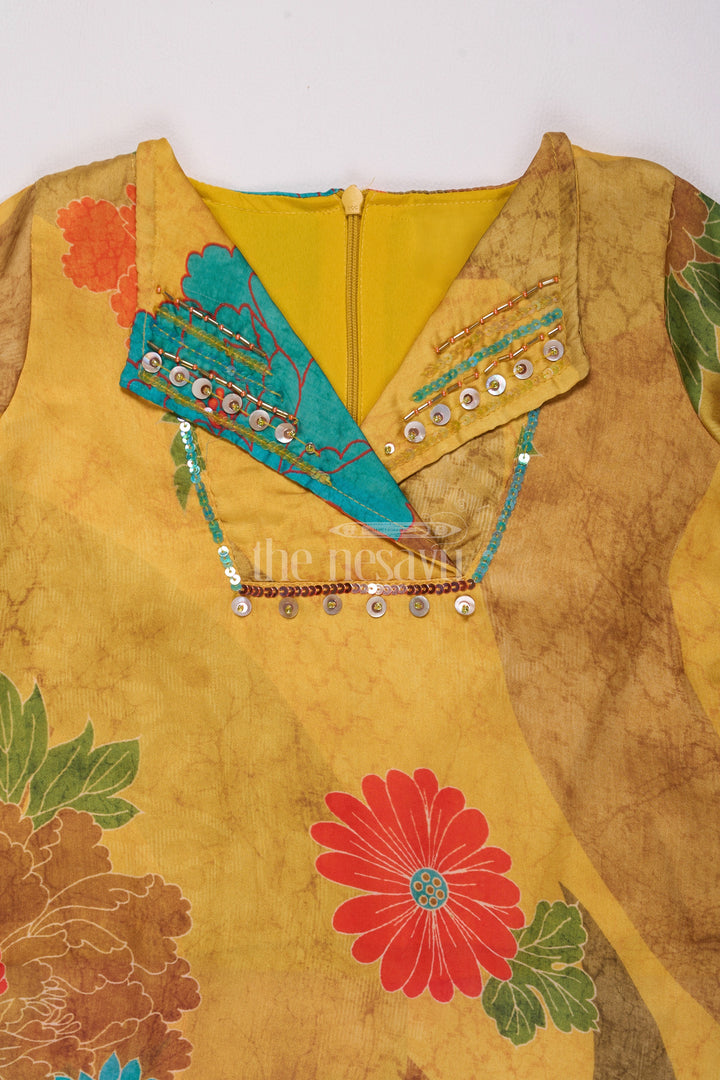 Mustard Mercerised Silk Cotton Girls Sharara Set with Bold Floral Print and Embellished Neckline