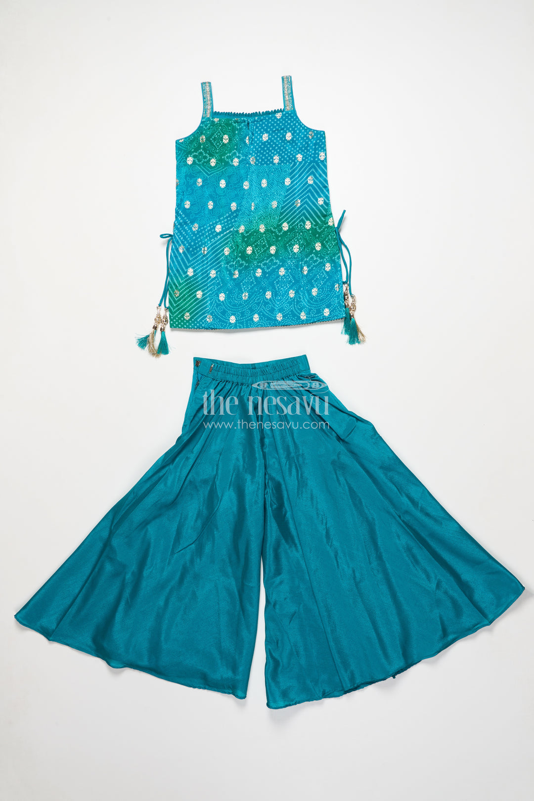 Girls sharara set in viscose silk with embroidered yoke for festive wear