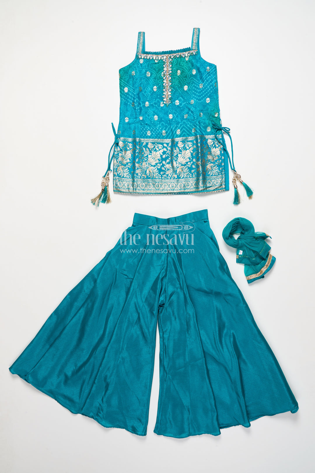 Girls sharara set in viscose silk with embroidered yoke for festive wear
