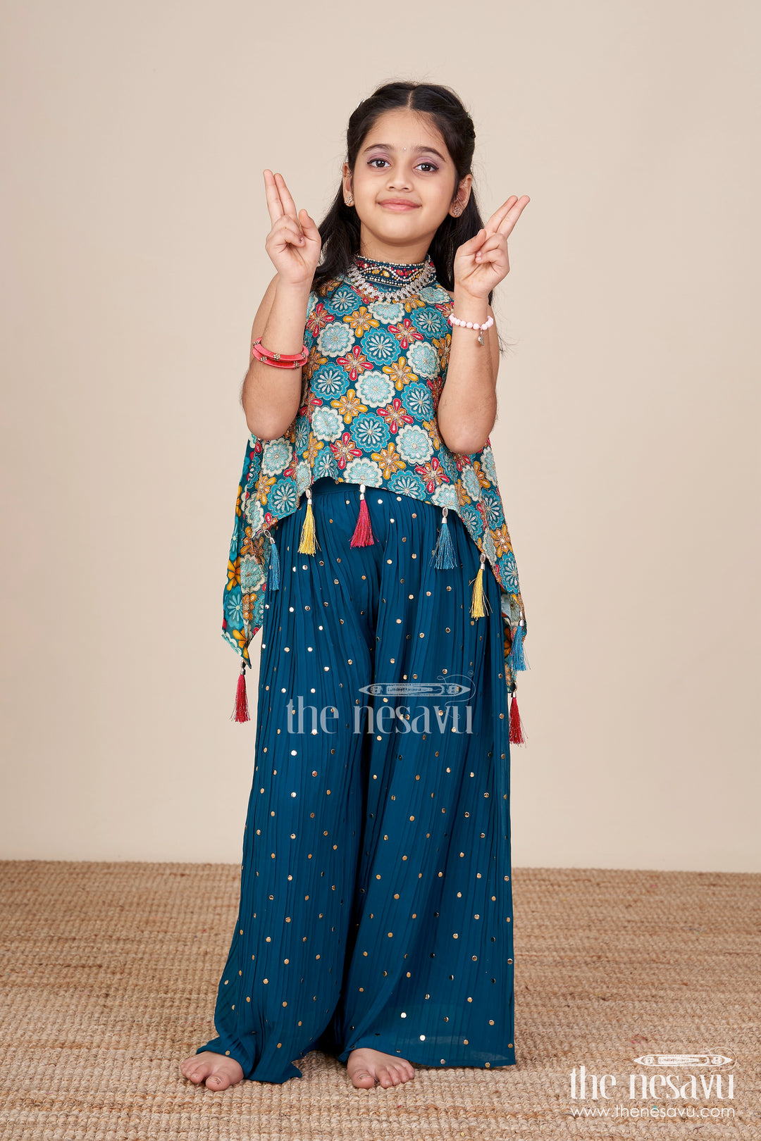 Ethnic girls sharara set with printed cape top and mirror accents