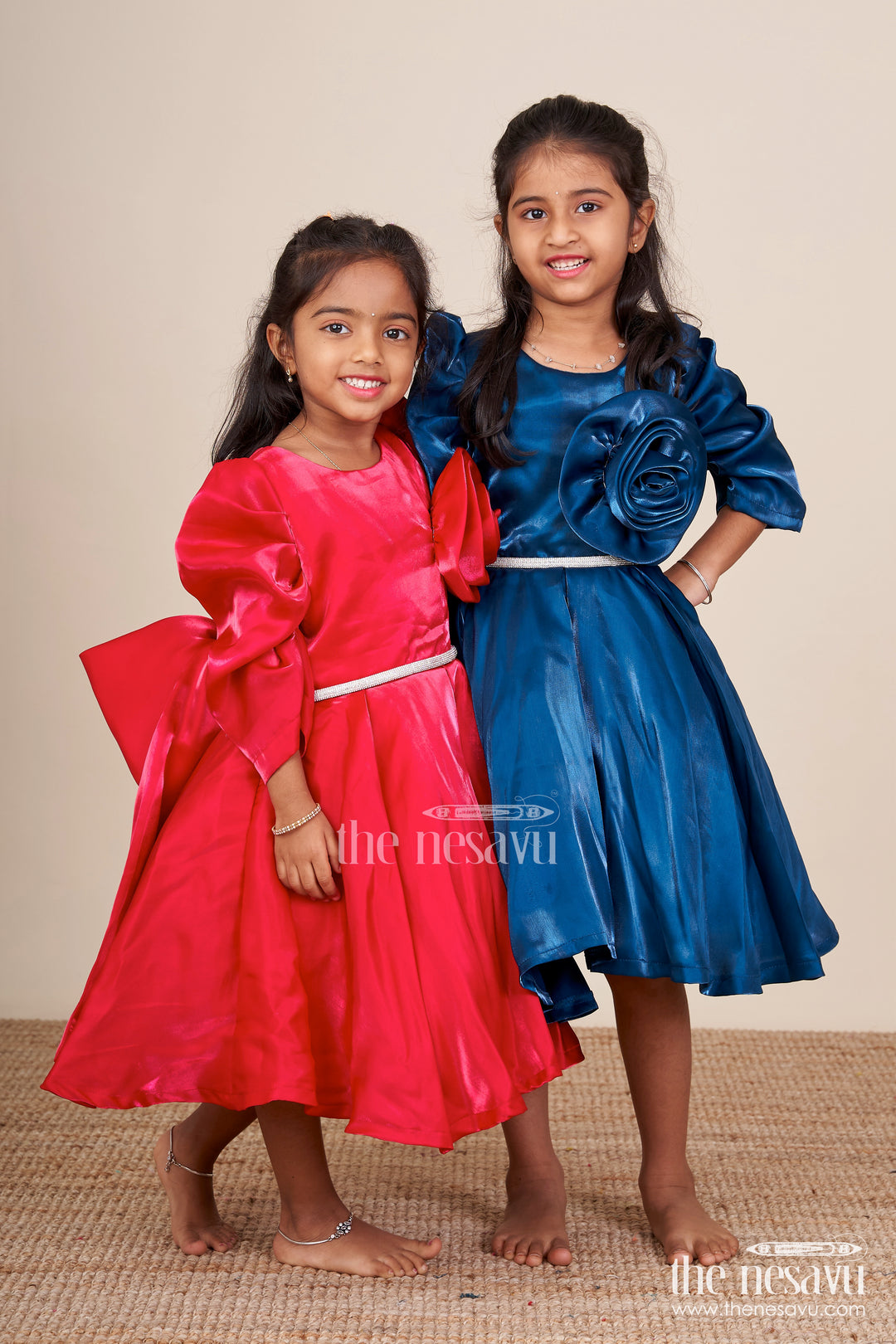 Satin girls party frock with stone embellished belt and matching bow
